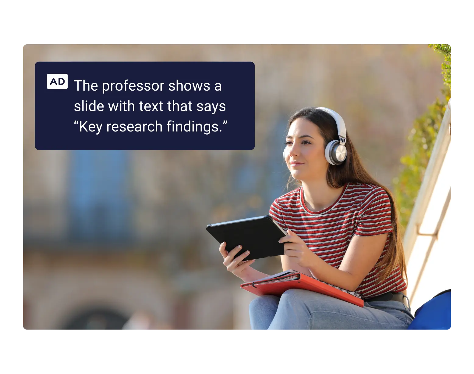 A student listens to an audio description in a video lesson.