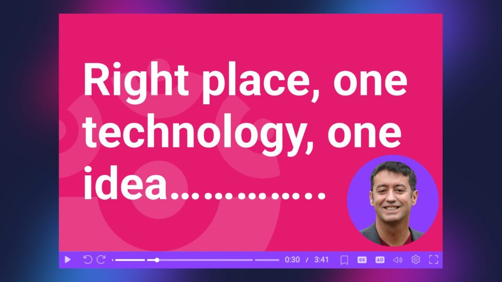 Player on gradient background that contains the phrase "right place, one technology, one idea........." with an inset webcam with man on purple background. Video player bar is purple.